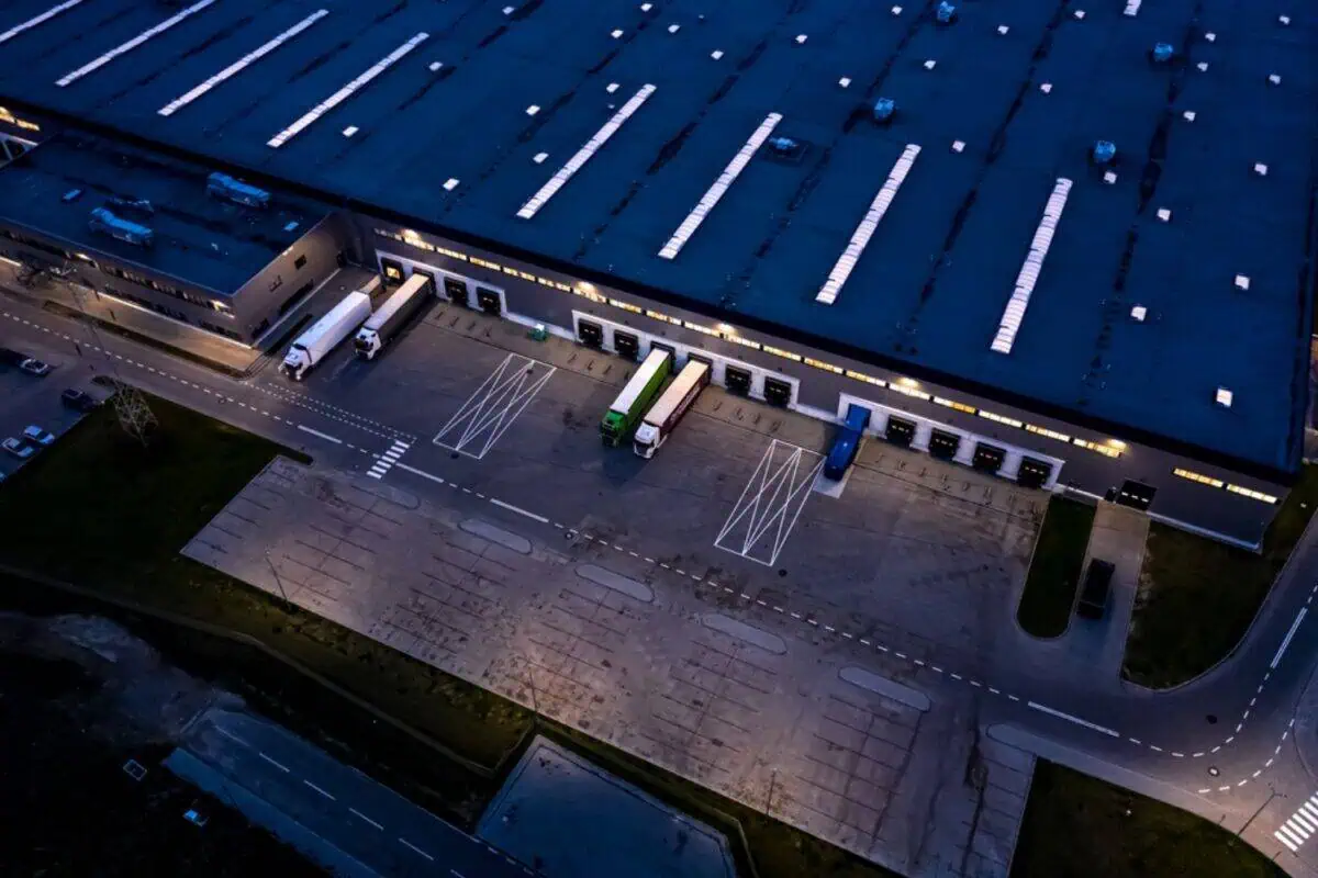 Freight trucks parked at a shipping facility